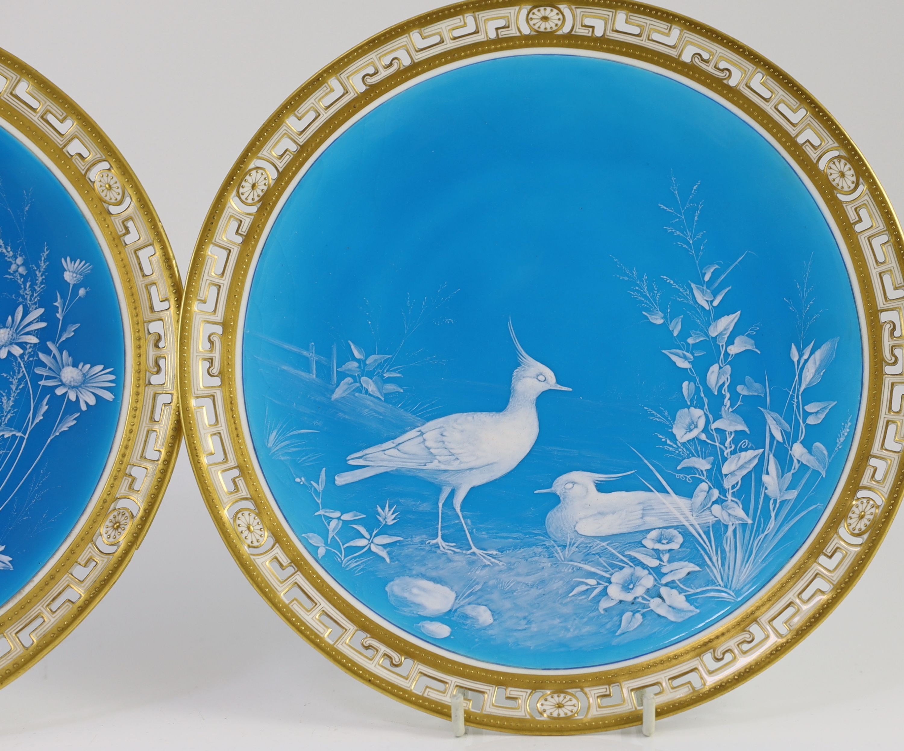 A pair of Minton ‘Limoges enamel’ cabinet plates, attributed to Desire Leroy, c.1877, 24cm diameter, One plate with small section of rim broken and glued